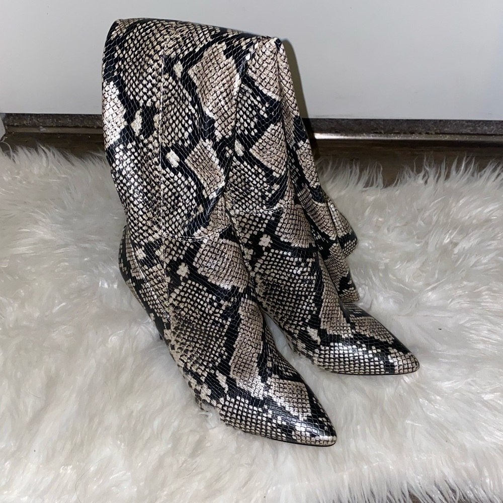 Snake print knee high boots